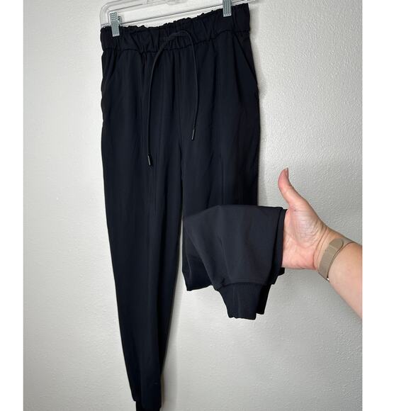 Lululemon Black Stretch High Rise Jogger Drawstring Waist Banded Hem 6 - Picture 2 of 13